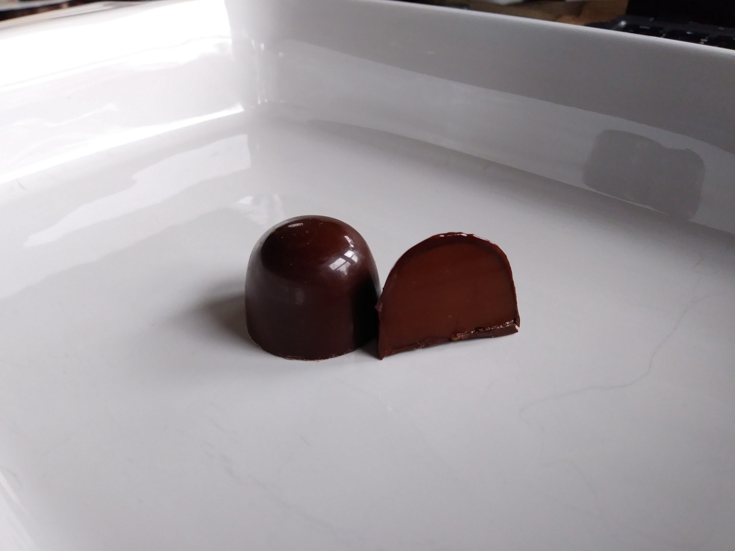 Citrus infused ganache using fresh lime, lemon zests and juices.