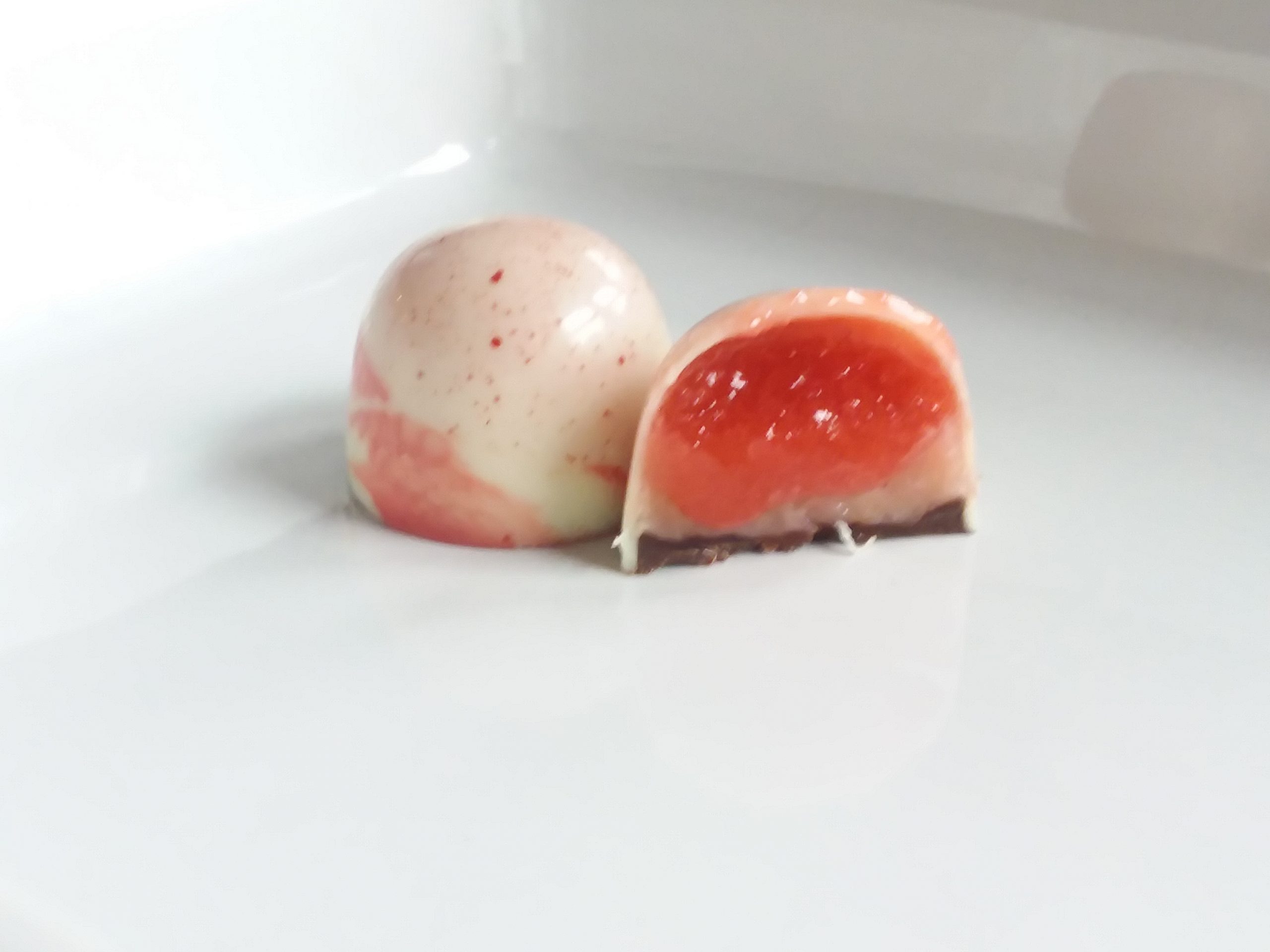 Perfectly tart strawberry pate de fruit is paired with a strawberry ganache